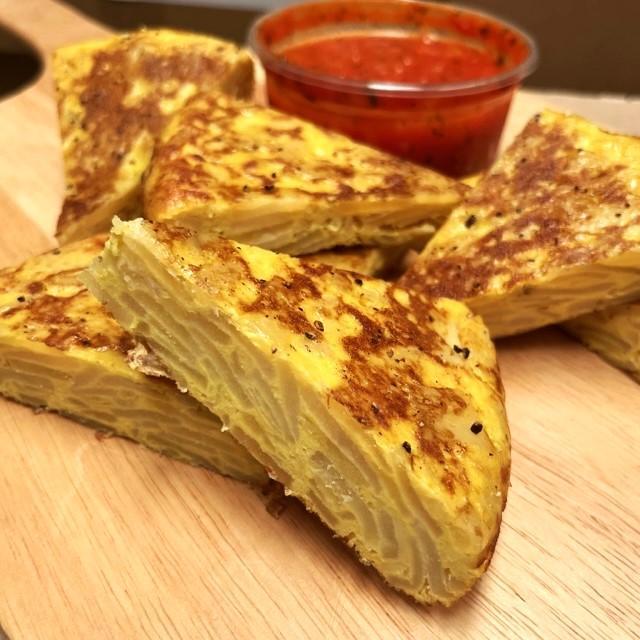 Spanish Style Tortilla served with Fresh Tomato Salsa. Includes 8 portions.