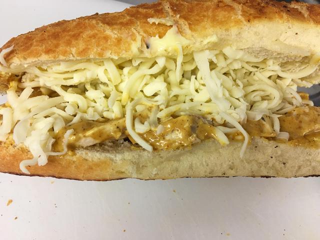 Coronation Chicken, Tomato, Mixed Leaves & Mozzarella Baguette Special