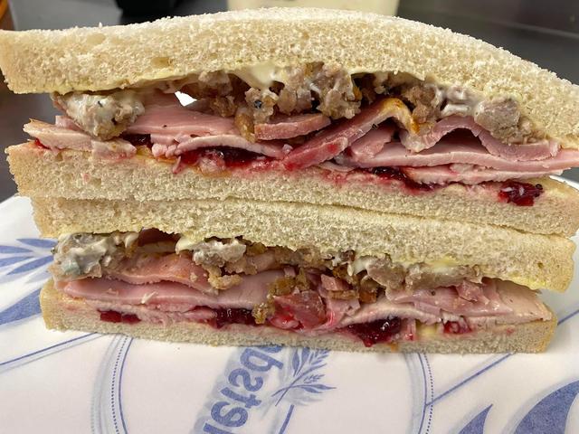 Roast Turkey, Sliced Gammon Ham, Crispy Smoked Bacon , Homemade Sausage & Sage Stuffing, Christmas Mayo & Cranberry Sauce Sandwich.